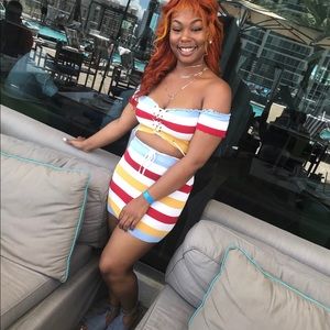 Two piece multi colored skirt set .